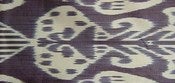 Image of dark ink grey ikat cushion