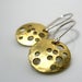 Image of harvest moons. earrings. brass.