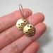 Image of harvest moons. earrings. brass.