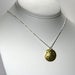 Image of harvest moon. necklace. brass.