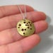 Image of harvest moon. necklace. brass.