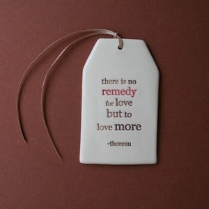 Image of ceramic quote tag - remedy for love