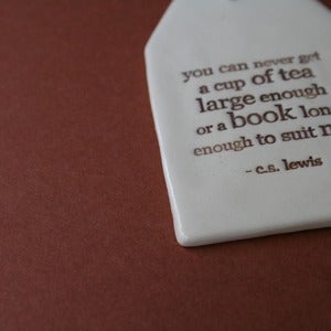 Image of ceramic quote tag - cup of tea or book