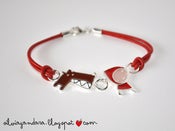Image of pulsera plata lobito y caperucita