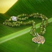 Image of Monstera Pendant Small with Peridot Necklace