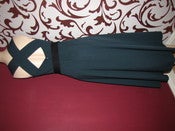 Image of green cross back vintage dress.