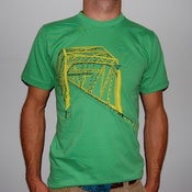 Truss bridge on grass gren $25