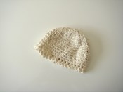 Image of hand knit Girl's hat in organic cotton- White