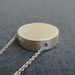Image of mini silver disc pendant