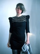 Image of Little black dress with hoody-scarf and 100 buttons