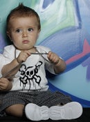 Image of baby skull drip tee