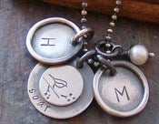 Image of soar wtih 2 rimmed initial charms
