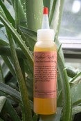 Image of Madame Koiteh's Magic Hair Potion