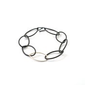 Image of steel and silver leaf bracelet