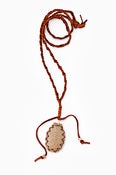 Image of FASHION CREAM OVAL ON BRAIDED LEATHER