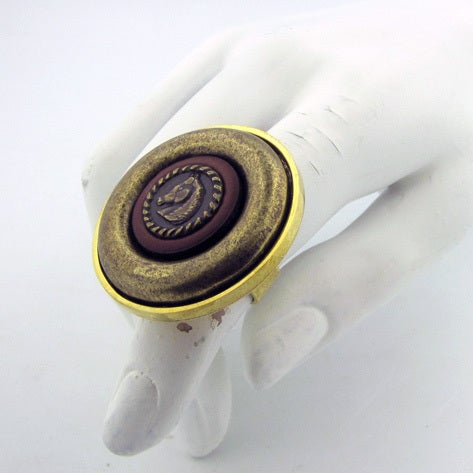 Stallion motif cocktail ring made with an Italian leather button