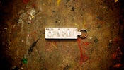 Image of ABNRML Metal Keychain