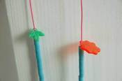 Image of necklace with fuse beads and plastic leaves