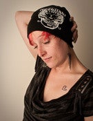 Image of Unisex Black Beanie cap with Flashlight Logo in White