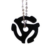 Image of 45 Adapter ACTUAL SIZE Necklace made from a recycled vinyl record.