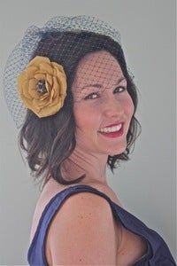 Image of Bianca - Navy Birdcage Veil paired with Golden Silk Flower with Vintage Brooch Center