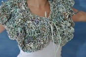 Image of ruffled capelette. wearable fiber art. 