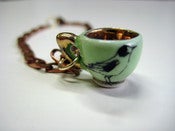 Image of Garden Bird tea cup charm bracelet