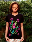 Image of Gnome in Rose Bush T