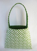 Image of green harringbone/ dollar green