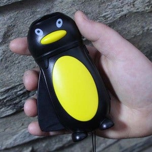 Penguin hand powered flashlight Image of Penguin hand powered flashlight