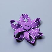 Image of Mini purple stitching bow