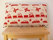 Image of Wings & Wheels Bolster Cushion