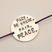 Image of PACE. DE VREDE. PAIX. PEACE.