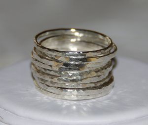 Image of Set of 9 handmade hammered sterling silver stackable rings, sizes 5, 6, 7, 8, 9, 10, 11