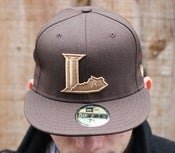 Image of brown lexington legends new era 