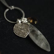 Image of Umbra Sapphire Sun Necklace