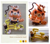 Image of donut biker/plush