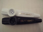 Image of Branded kazoos (black or white)