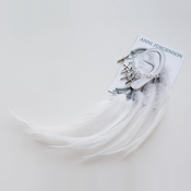 Image of White feathers with 5 silver coloured crosses
