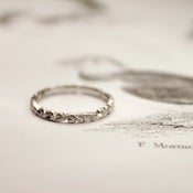 Image of platinum 2mm floral carved