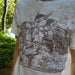 Image of Citycrusher™ Robocat "Replenish The Earth" White Burnout Tshirt