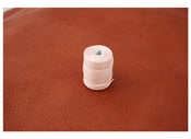 Image of Cream colored thread