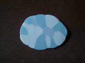 Image of blue coloured cloud brooch