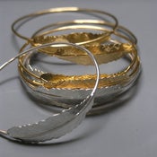 Image of gold sweetest feather bracelet