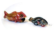 Image of Incredible Whale Eating Fish tin toy