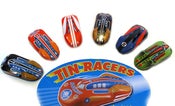 Image of Colourful classic 1960s tin rocket racing cars