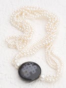 Image of Four Strand Fresh Water Pearl Necklace with Granite Centre Piece