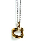Image of Gold Teeth Pendant