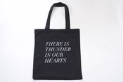 Image of thunder in our hearts tote in black 