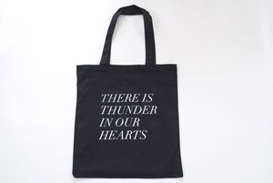 Image of thunder in our hearts tote in black